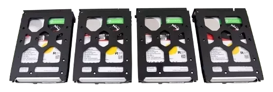 Four Seagate IronWolf hard drives in protective enclosures aligned side by side