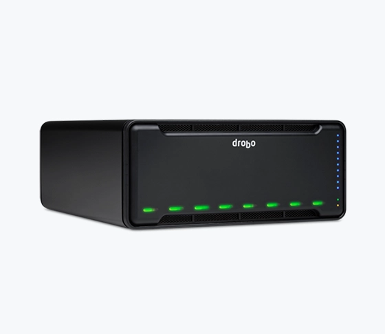 A Drobo storage device with a sleek black design, featuring a front panel with green LED indicators and a blue status light strip.