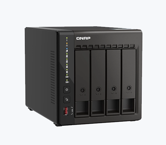 A QNAP NAS device with a sleek black design, featuring four drive bays and front-facing controls and ports