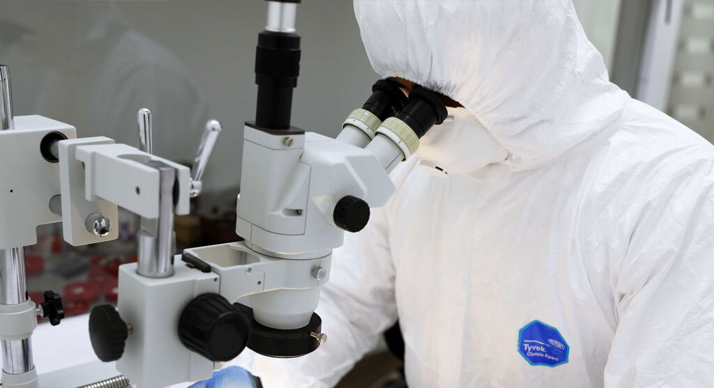 PITS data recovery engineer in a cleanroom lab