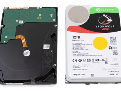 Two views of a Seagate IronWolf Pro 12TB hard drive showing front label and back circuit board.